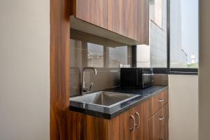 Wandr Hotel Golf Course Road, Near Cyber City, Gurugram