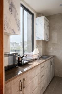 Wandr Hotel Golf Course Road, Near Cyber City, Gurugram