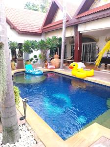Luxurious and spacious Poolvilla at about 500 mtr from Jomtien Beach with luxurious facility Private Swimming Pool, Jaccuzi,Fitness Room,Table Tennis and many more