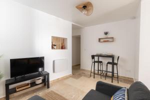 Appartements Suite Lueur de Sable - Hypercentre - WiFi : photos des chambres