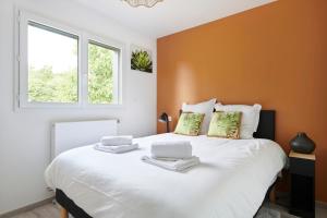 Maisons de vacances Les Lambannieres - Maison neuve, calme avec jardin : photos des chambres