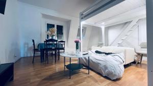 Appartements Studio cosy proche de Paris : photos des chambres