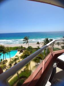 Penthouse Cimarrón Suites Margarita Familiar 5 camas, piscina, cancha de tenis y playa