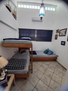 Penthouse Cimarrón Suites Margarita Familiar 5 camas, piscina, cancha de tenis y playa