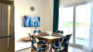 Rheia Properties - SANTA FE