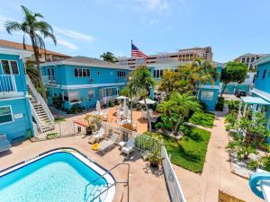 Sunlit Condo Heated Pool across from Beach