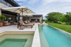 Villa Amada at Porta Fortuna Ocean Views Staff Golf Cart by Mita Residential