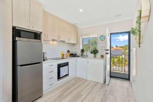 12 Calming Coral Beach Beautiful 2BRM