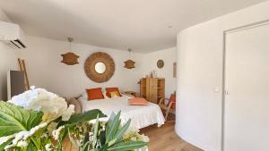 Appartements Splendide Studio parking clim terrasse : photos des chambres