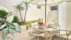 Appartements Splendide Studio parking clim terrasse : photos des chambres