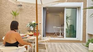 Appartements Splendide Studio parking clim terrasse : photos des chambres