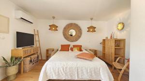 Appartements Splendide Studio parking clim terrasse : photos des chambres