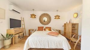 Appartements Splendide Studio parking clim terrasse : photos des chambres