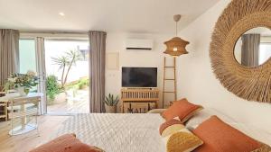 Appartements Splendide Studio parking clim terrasse : photos des chambres