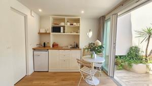 Appartements Splendide Studio parking clim terrasse : photos des chambres