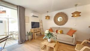 Appartements Splendide Studio parking clim terrasse : photos des chambres