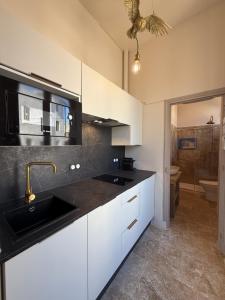 Appartements Domus Romana - Centre ville de Nimes Arenes : photos des chambres