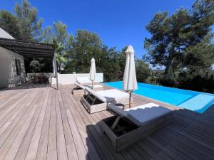 Villas Calme et confort dans un ecrin de verdure : photos des chambres