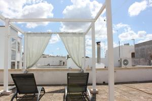 Camera della radio con terrazza nel centro storico di Racale