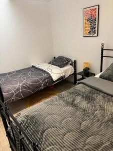 Appartements 2 Bed House, Parking and Courtyard, Villemomble, Paris : photos des chambres