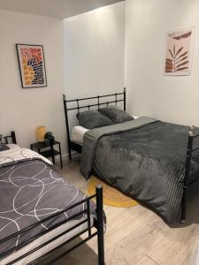 Appartements 2 Bed House, Parking and Courtyard, Villemomble, Paris : photos des chambres