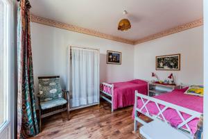 Maisons de vacances Maison De Vacances Pres Du Centre : photos des chambres