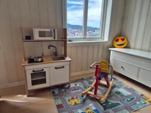 Nydelig hus med privat hage og fantastisk utsikt over Fisketorget, Bryggen og Bergen sentrum
