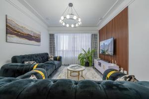 elegant beautifully furnished two bedroom apartment with unbeatable city scenic views with swimming pool and well equipped gym and ample parking space