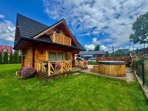 Góralska Osada Tatra House z jacuzzi - 3hvězdičkové hotely ve městě Białka Tatrzańska