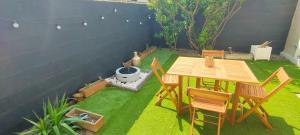 Appartements Romantique chic 150m plage patio : photos des chambres