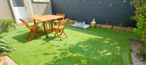 Appartements Romantique chic 150m plage patio : photos des chambres