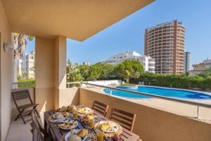 Spacious & Sunny Apartment with Pool by HostWise