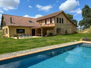 Maisons de vacances Maison Puchouaou Gite 8 ou 12 personnes avec piscine privee : photos des chambres