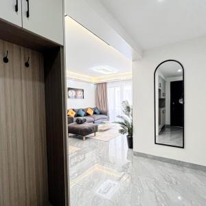 lovely fully furnished three bedroom apartment with swimming pool well equipped gym ample parking space children playing ground and amazing scenic views