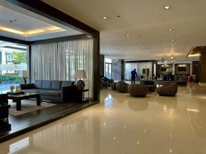 staycation condo one bedroom balcony w pool view near SMX SM MOA IKEA NAIA DFA OCEAN PARK