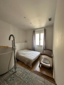 Appartements Air-conditioned apartment : photos des chambres