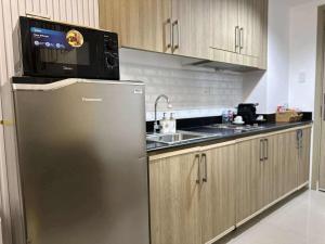 STAYCATION CONDO SHORE RESIDENCES one bedroom w balcony pool view near SMX SM MOA IKEA NAIA DFA OCEAN PARK DFA