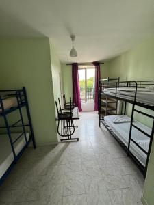 Auberges de jeunesse Hostel Wilson : Lit Simple dans Dortoir de 4 Lits