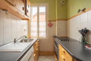 Appartements Au Petit Bonheur Proche Centre et Lac : photos des chambres