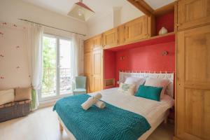 Appartements Au Petit Bonheur Proche Centre et Lac : photos des chambres