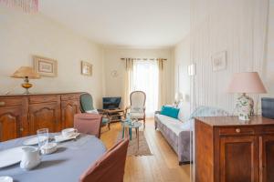 Appartements Au Petit Bonheur Proche Centre et Lac : photos des chambres