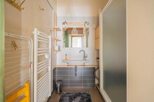 Appartements Au Petit Bonheur Proche Centre et Lac : photos des chambres