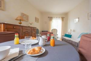 Appartements Au Petit Bonheur Proche Centre et Lac : photos des chambres