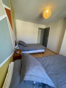 Maisons de vacances Maison Cote Halle L-Artiste : photos des chambres