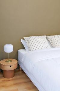 Appartements Haussmannien des Jardins de la Fontaine : photos des chambres