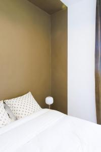 Appartements Haussmannien des Jardins de la Fontaine : photos des chambres