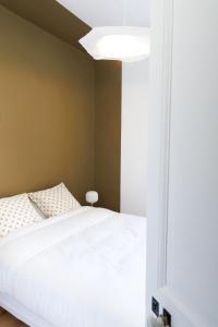 Appartements Haussmannien des Jardins de la Fontaine : photos des chambres