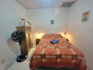 Quarto Casas na Praça Serra Grande