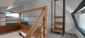 Appartements APPARTEMENT 4 PERSONNES 100 metres du Lac jardin prive : photos des chambres
