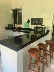 Quarto triplo com banheiro em casa compartilhada COP 30